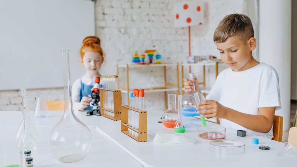 Two students working together on an experiment, a practical session supported by digital twin virtual labs