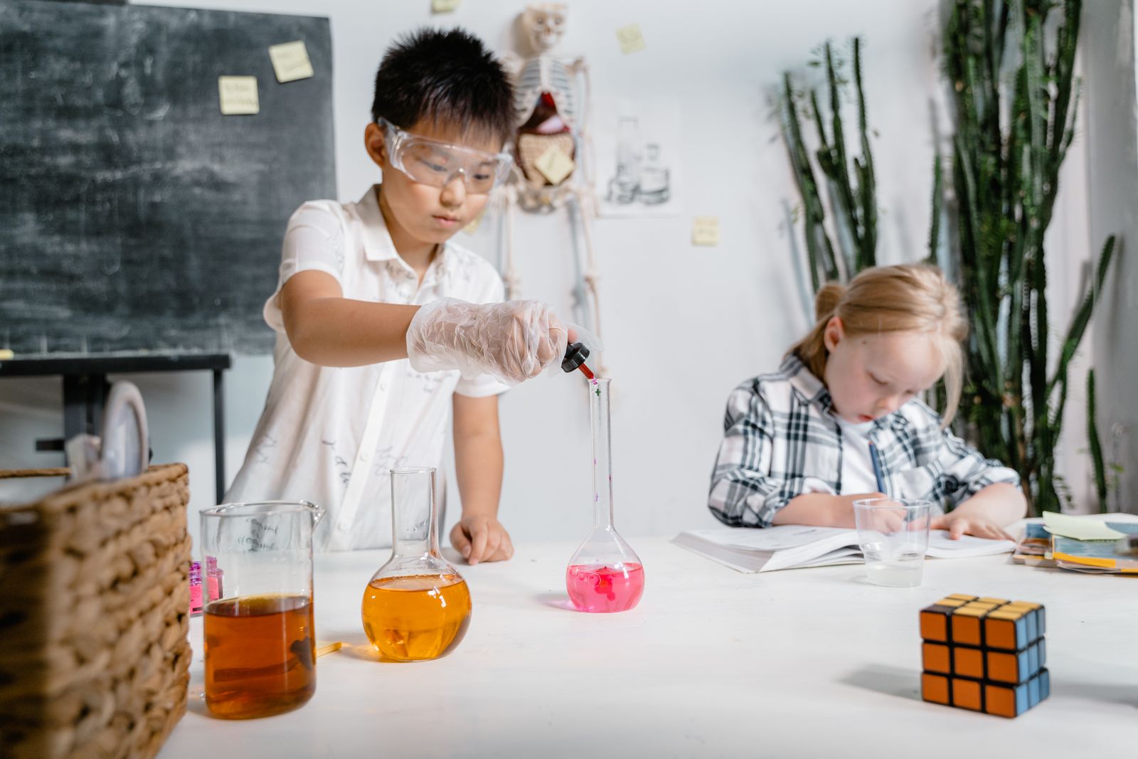 Students doing an experiment in a school laboratory, prepared through digital twin virtual labs