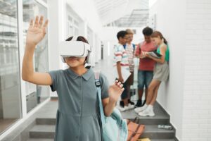 Girl in a school corridor exploring extended reality in education with a VR headset