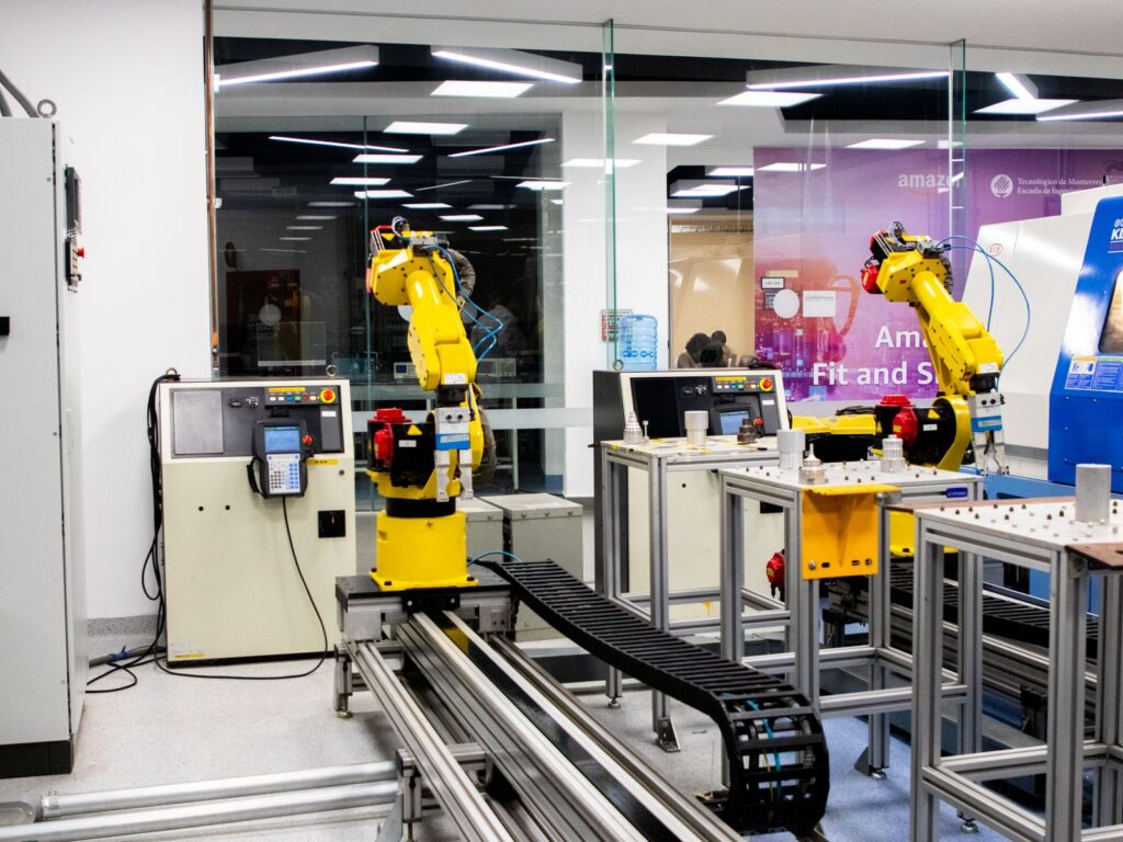 Robots working on a factory line, showing why students need Industry 4.0 skills