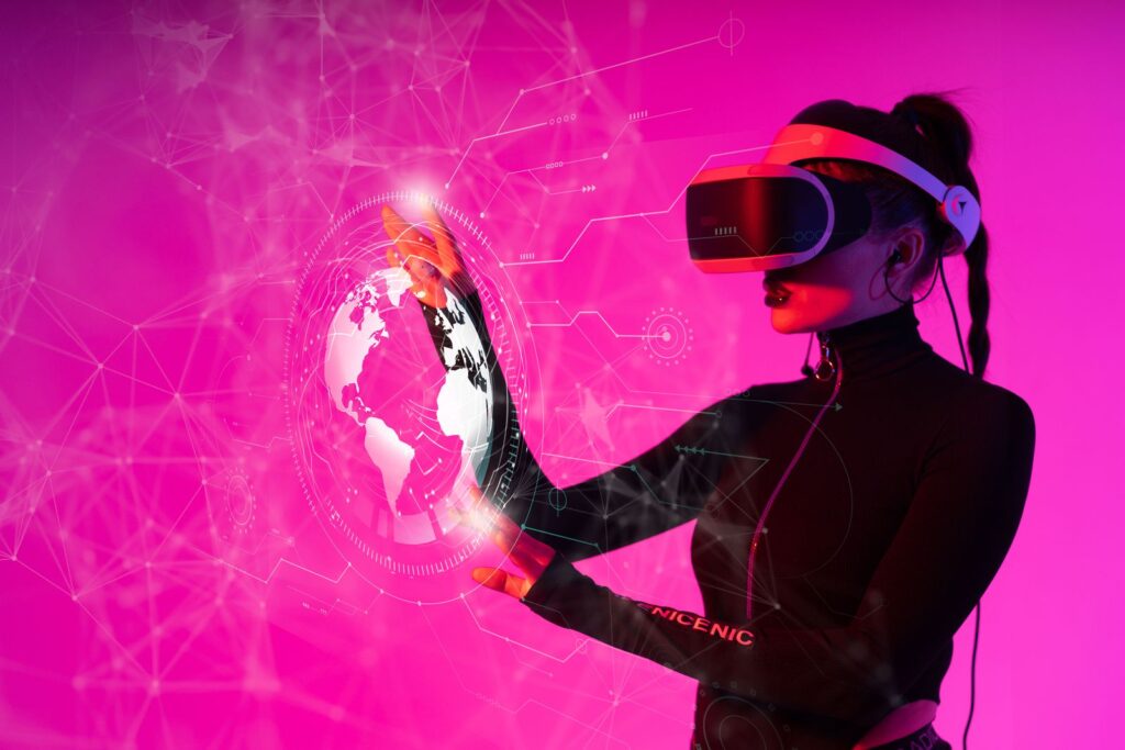 A student reaching out to touch a hologram during a mixed reality in education session