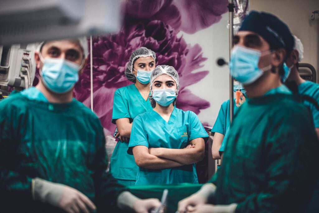 A surgical team in an operating room, the setting virtual reality in medical education prepares students for