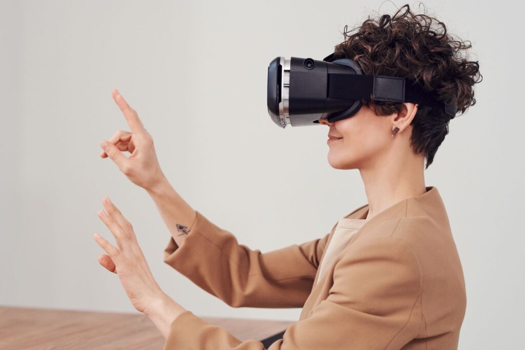 XR learning student using hand gestures inside a virtual reality headset