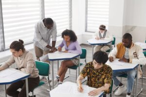 Students taking a test in class, one way to measure XR learning outcomes