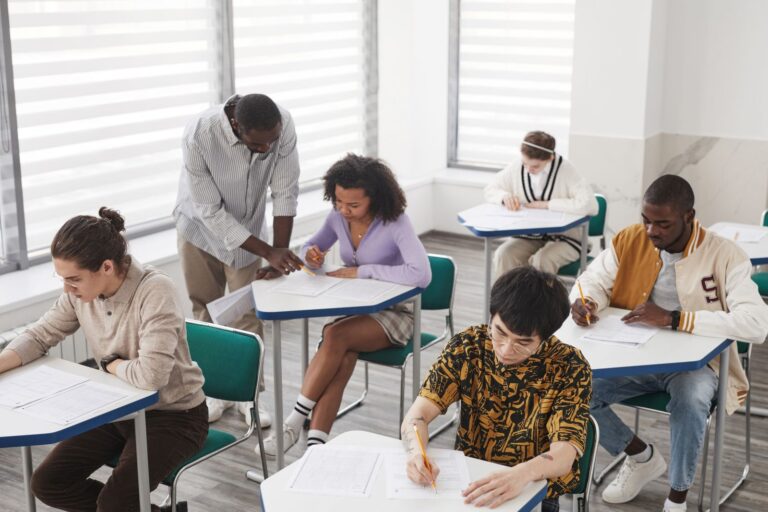 Students taking a test in class, one way to measure XR learning outcomes