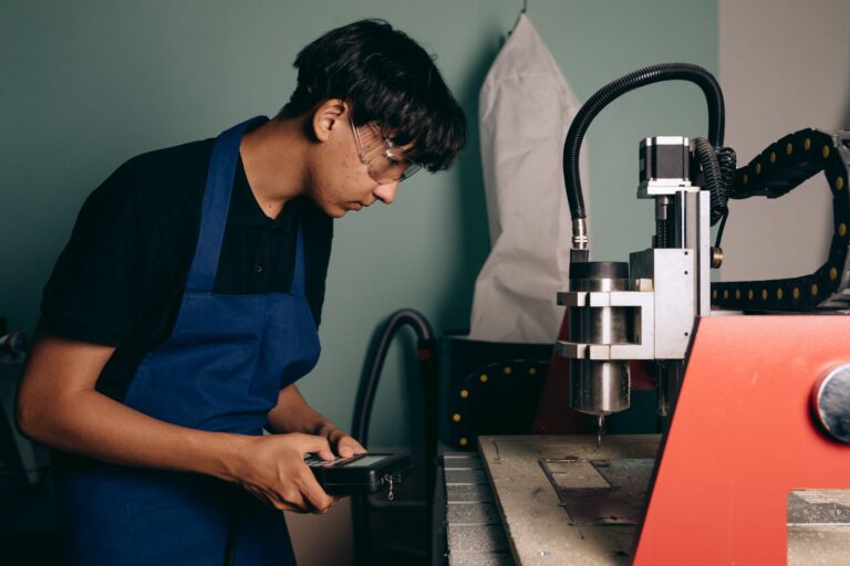 A trainee working at an industrial machine after XR skill training